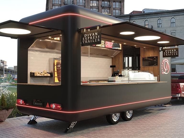 Schwarzer Foodtrailer mit LED-Leiste, Verkaufsklappe und Edelstahlküche – ideal für Streetfood und Eventgastronomie
